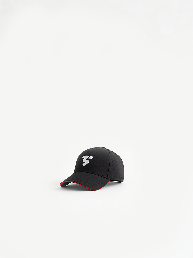 Sports Cap in black — side angle showing red under-brim detail