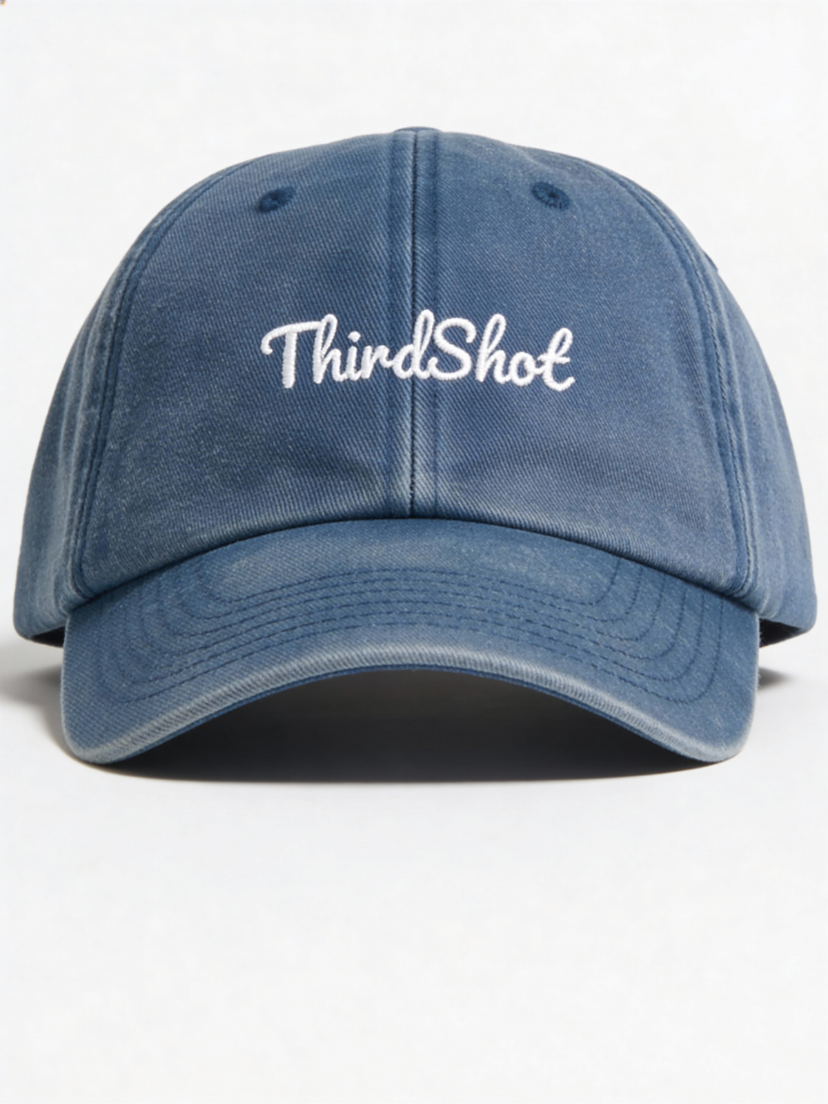 Vintage Wash Cap in washed blue — front view with ThirdShot script embroidery