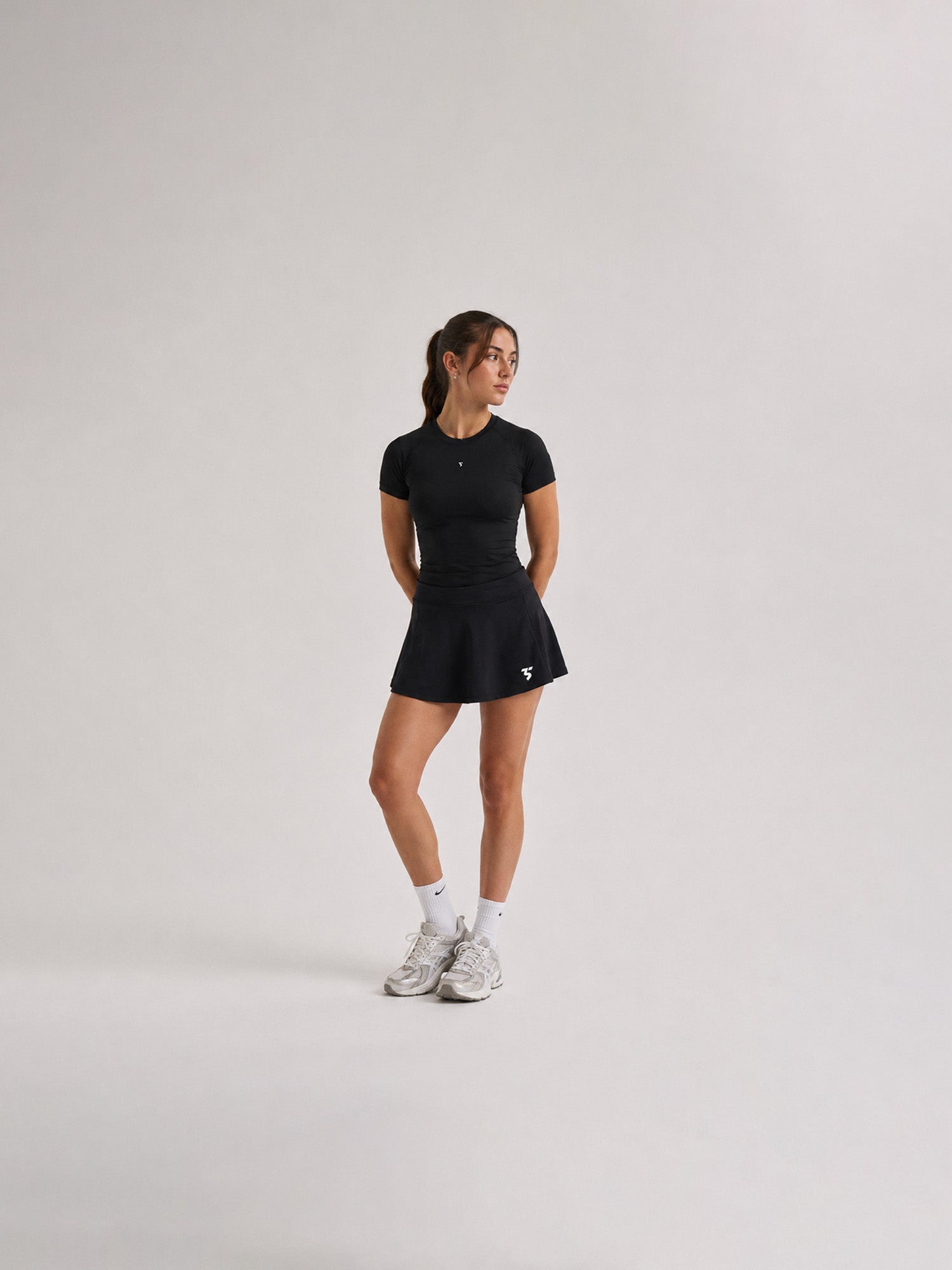 Third Shot Women's Tennis & Padel Skort in black, front view