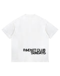 Racket Club Sundays oversized tee in white, back view with black distressed print across the lower back